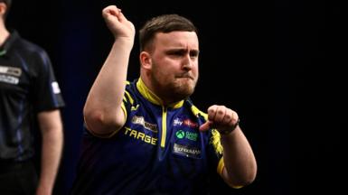 Luke Littler celebrates a 170 checkout