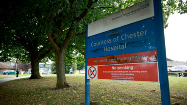 Signage is seen outside an entrance to the Countess of Chester Hospital in Chester