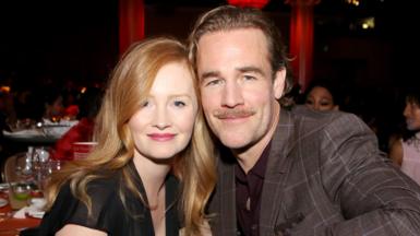 Kimberly Brook (left) and James Van Der Beek pictured together sat down while attending the Trevor Project's TrevorLIVE LA 2018 at The Beverly Hilton Hotel in California