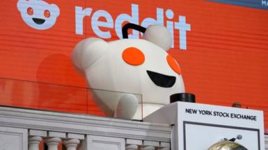 Reddit's mascot at the New York Stock Exchange