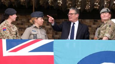 Sir Keir Starmer meets uniformed aircrew members during a visit to Taif Airbase in Saudi Arabia, 8 April.