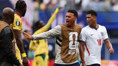 Morgan Rogers and Jude Bellingham react as they walk away from Ghana players