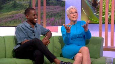 Ncuti and Jamie sitting next to each other on The One Show sofa