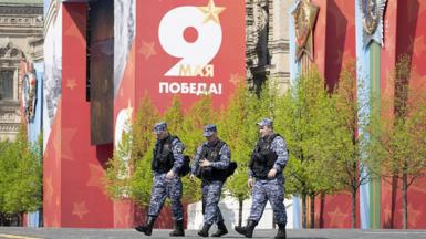 A Victory Day sign is seen in the middle of Red Square in Moscow