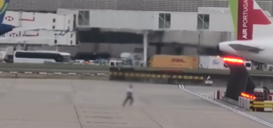 Man runs across Heathrow taxiway