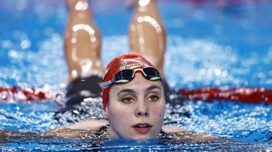 A female athlete in a swimming pool