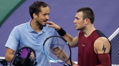 Daniil Medvedev (left) speaks to Jack Draper at the net after their Indian Wells quarter-final