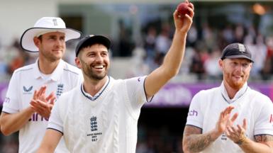 Mark Wood celebrates a five-wicket haul