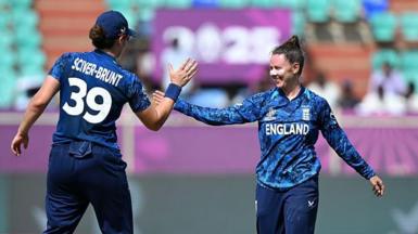 Nat Sciver-Brunt (left) and Linsey Smith celebrate a wicket against New Zealand at the Women's World Cup