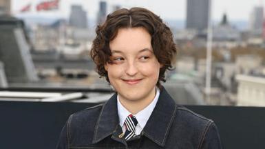 Bella Ramsey attends the HBO Max Experience London photocall at Piccadilly Lights on March 24, 2026 in London, England