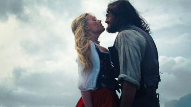 (L-r) Actor, Producer MARGOT ROBBIE as Catherine Earnshaw and JACOB ELORDI as Heathcliff in Wuthering Heights, a Warner Bros. Pictures Release. a still from the film