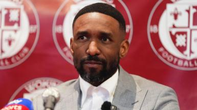 Newly appointed Woking manager Jermain Defoe during a news conference at the Laithwaite Community Stadium, Woking.