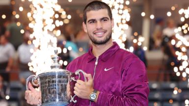 Carlos Alcaraz with the US Open trophy in 2025