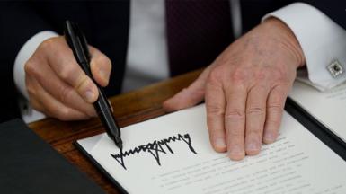 President Donald Trump signs a series of executive orders at the White House on January 20, 2025, in Washington, DC.