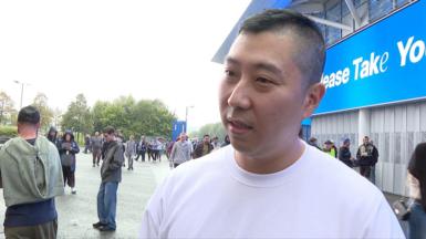 A picture of South Korean fan James outside the Amex Stadium after he found out he was not allowed in.