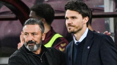 Derek McInnes and Danny Rohl embrace on the sidelines