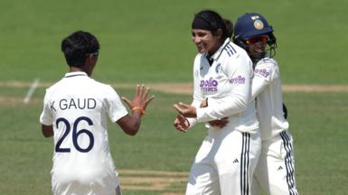 India's Sneh Rana (centre) celebrates the wicket of England's Sophie Ecclestone that secures victory at Lord's