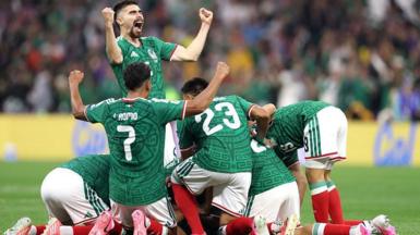 Mexico players celebrate at the Azteca 