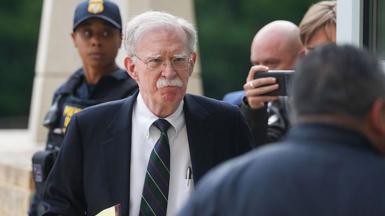 John Bolton arrives in court on Friday