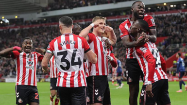 Sunderland players celebrate Dan Ballard's opener