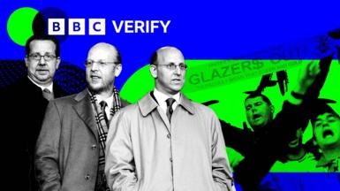A bold, graphic-style image featuring three of the Glazer brothers—Joel, Avram, and Bryan—in black-and-white, all wearing suits and overcoats, standing against a split blue‐and‐green background. In the top left, the white “BBC VERIFY” logo sits on solid blue. Behind the brothers a separate image is composited, Manchester United fans tinted green are shown shouting and waving a banner that reads “GLAZER$ OUT! SO PROUDLY WEAR THAT GREEN AND GOLD.”