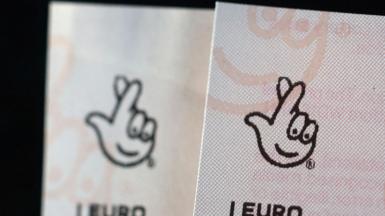 Zoomed in view of two EuroMillions tickets side-by-side, with the National Lottery logo seen at the top of both