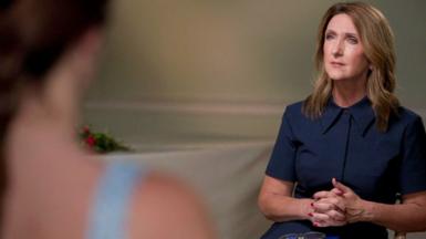 Victoria Derbyshire interviewing a teenage girl, seen from over her shoulder and out of focus