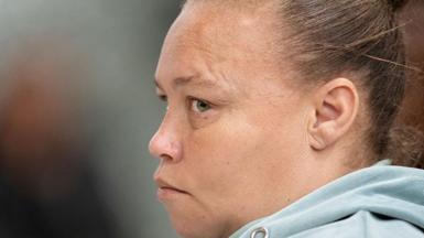 Kelly Smith, wearing a greyish sweater, listens on as her sentence is read out in the Western Cape high court