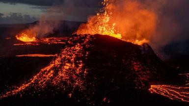 Lava spews from multiple craters of the Sundhnkur volcano on June 3, 2024 on the Reykjanes peninsula near Grindavik, Iceland. 