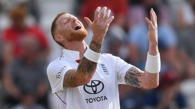 England captain Ben Stokes throws his arms up in frustration