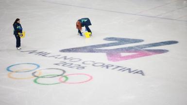 Ice specialists fixing the surface on the Milano Ice Skating Rink