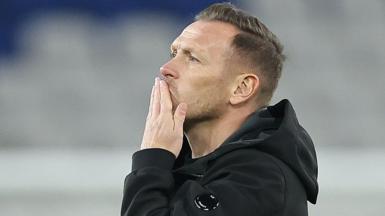 Craig Bellamy blows a kiss to Wales fans after his side beat Montenegro