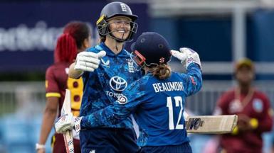 Amy Jones and Tammy Beaumont celebrating centuries against West Indies
