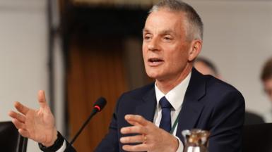 A picture of Tim Davie speaking