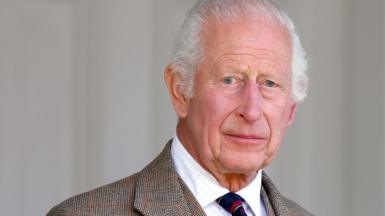 King Charles III wears a Royal Marines tie as he attends The Braemar Gathering 2024 at The Princess Royal and Duke of Fife Memorial Park on 7 September 2024 in Braemar, Scotland.