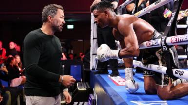 Bilal Fawaz speaks to Eddie Hearn after beating Ryan Kelly in Wolverhampton to defend his British and Commonwealth titles