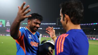 Sanju Samson of India celebrates victory alongside Gautum Gambhir, Head Coach of India following the ICC Men's T20 World Cup India & Sri Lanka 2026 Super 8 match between India and West Indies at Eden Gardens