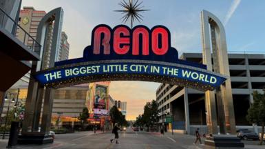 A neon sign welcoming people to Reno, Nevada