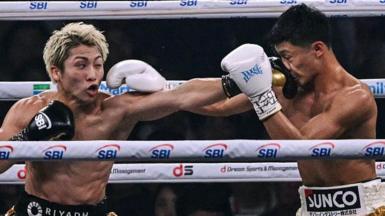 Naoya Inoue lands a punch on Junto Nakatani
