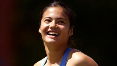 Emma Raducanu smiles after completing her opening victory at Queen's