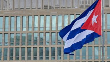 A Cuban flag flies near the US embassy in Havana in 2025.