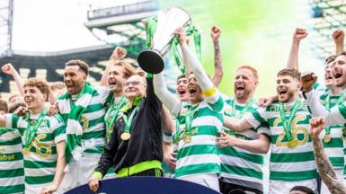 Celtic Interim Manager Martin O'Neill and Callum McGregor lift the league title during a William Hill Premiership match between Celtic and Heart of Midlothian at Celtic Park, on May 16, 2026.