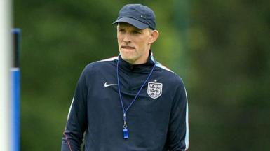 Thomas Tuchel wearing a baseball cap and England branded top during a training session at the World Cup