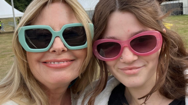 Woman and young woman wearing colourful glasses