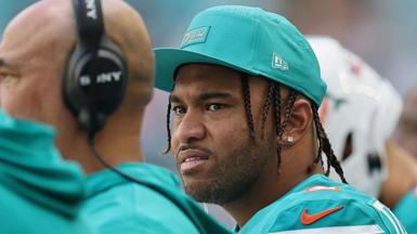 Tua Tagovailoa looks on from the sidelines during the Miami Dolphins' game against the Cincinnati Bengals on 21 December 2025