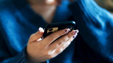 Woman looking at mobile phone