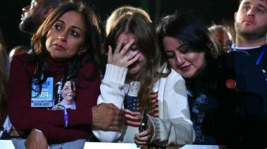 Supporters react to election results during an election night event for US Vice President and Democratic presidential candidate Kamala Harris at Howard University in Washington, DC, on November 5, 2024