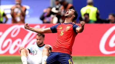 Mikel Merino celebrates his winning goal for Spain