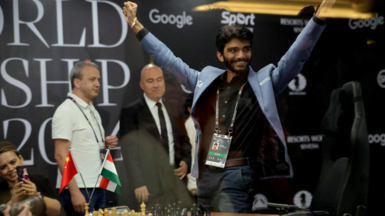 Chess grandmaster Gukesh Dommaraju of India celebrates after winning Game 14 against Ding Liren (not pictured) of China at the FIDE World Chess Championship in Singapore, 12 December 2024