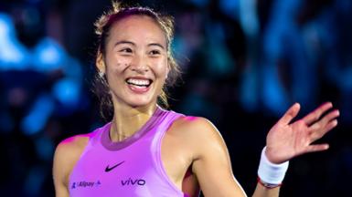 Zheng Qinwen thanks the crowd after victory at the WTA Finals